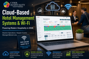 Hotel front desk staff using cloud-based property management system on tablet in modern lobby